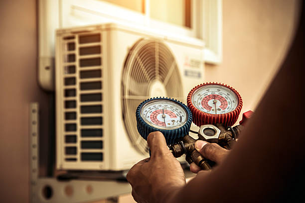 Professional Air Conditioning Service technician working in Hurley, NY